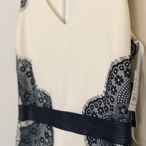 Off white with navy dress